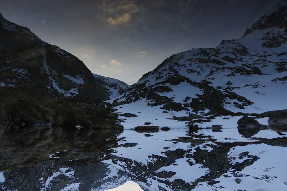 snow covered mountain during daytime