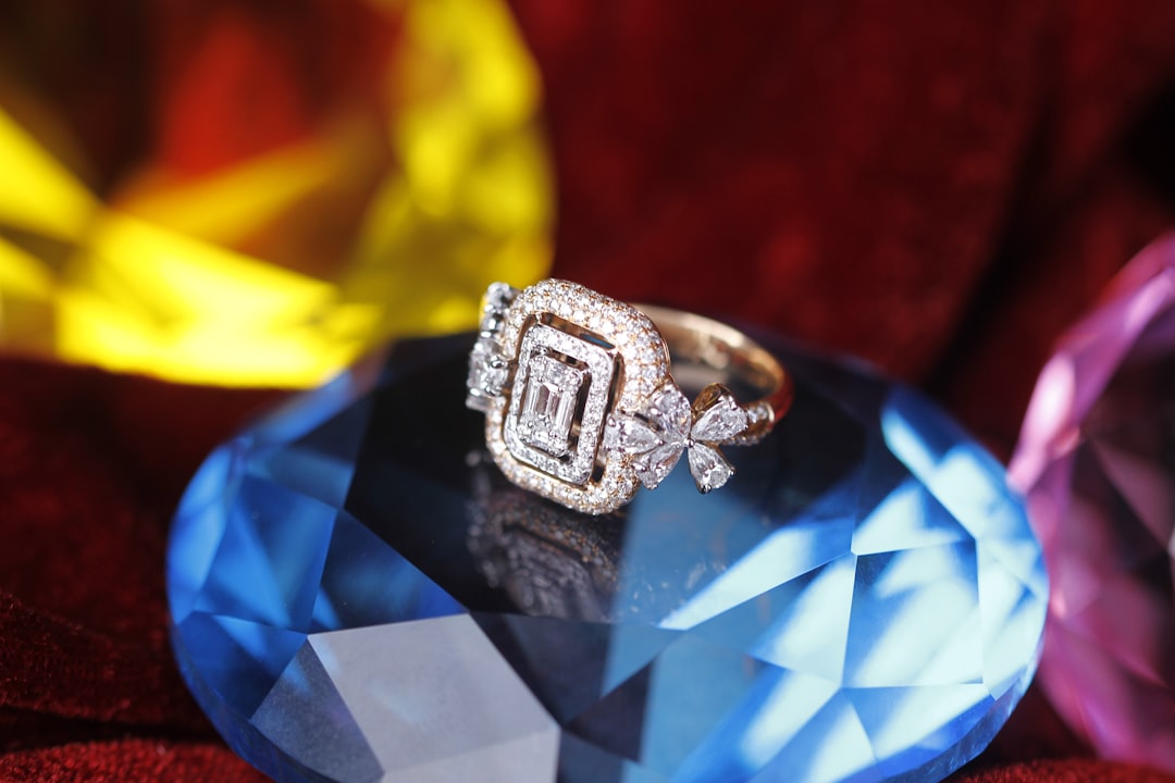 silver and purple ring on yellow and blue textile, Bulbul Ahmed Photography<p></figure>PROFESSIONAL FASHION, WEDDING & PRODUCT PHOTOGRAPHER | GRAPHICS DESIGNER</p><p>Talk: 01971961962</p><p>bulbul252@gmail.com</p><p>FB: https://www.facebook.com/blueboy252/