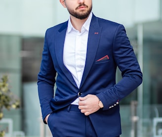 man in blue suit standing