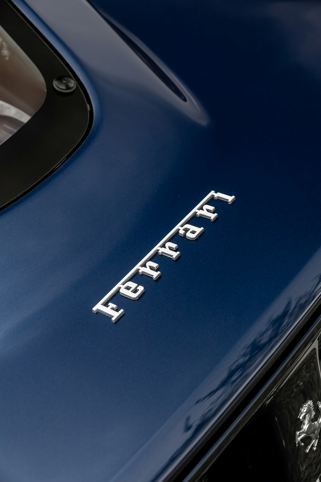 blue and white car with white and black license plate