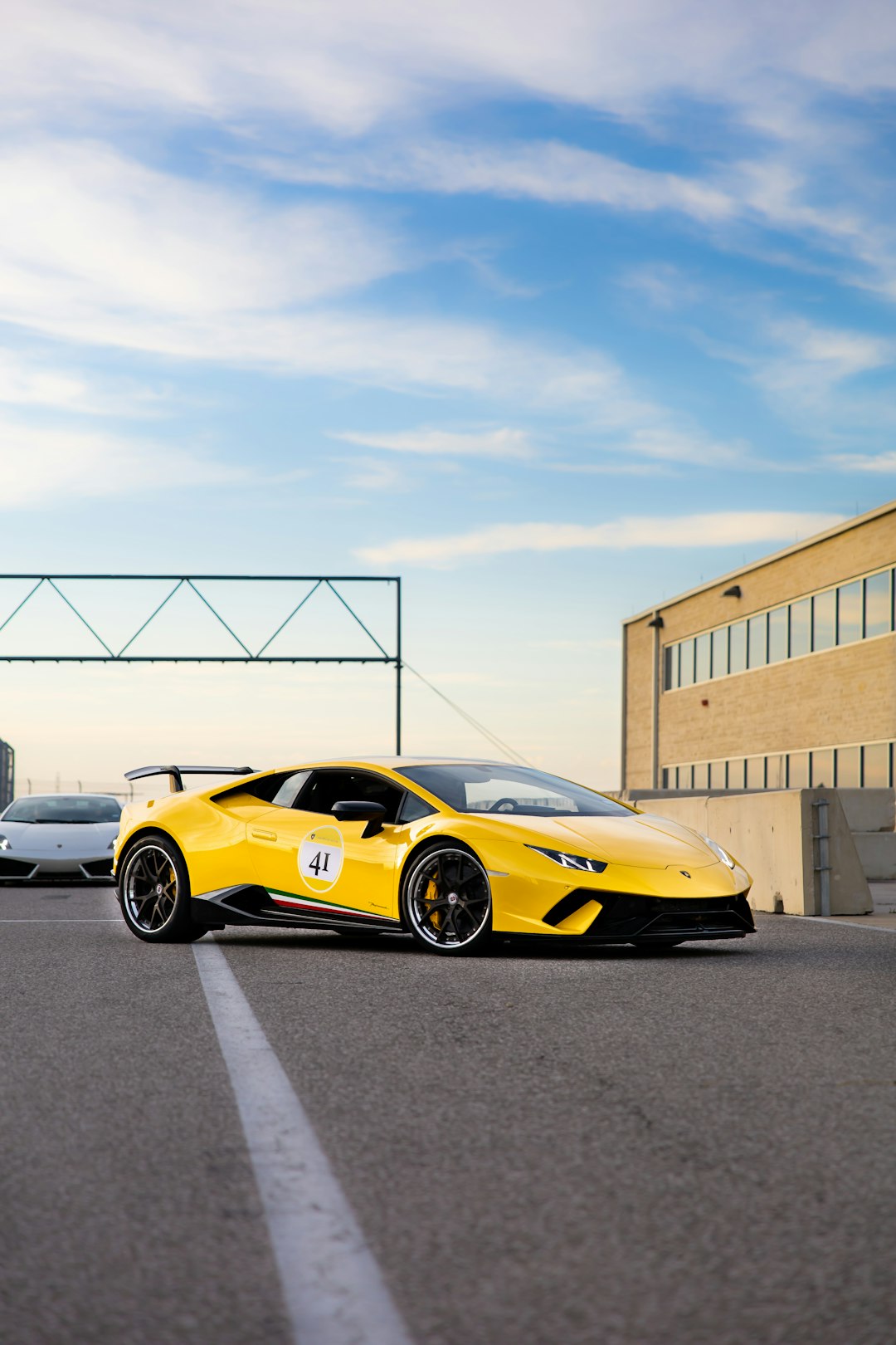 yellow ferrari 458 italia parked on parking lot