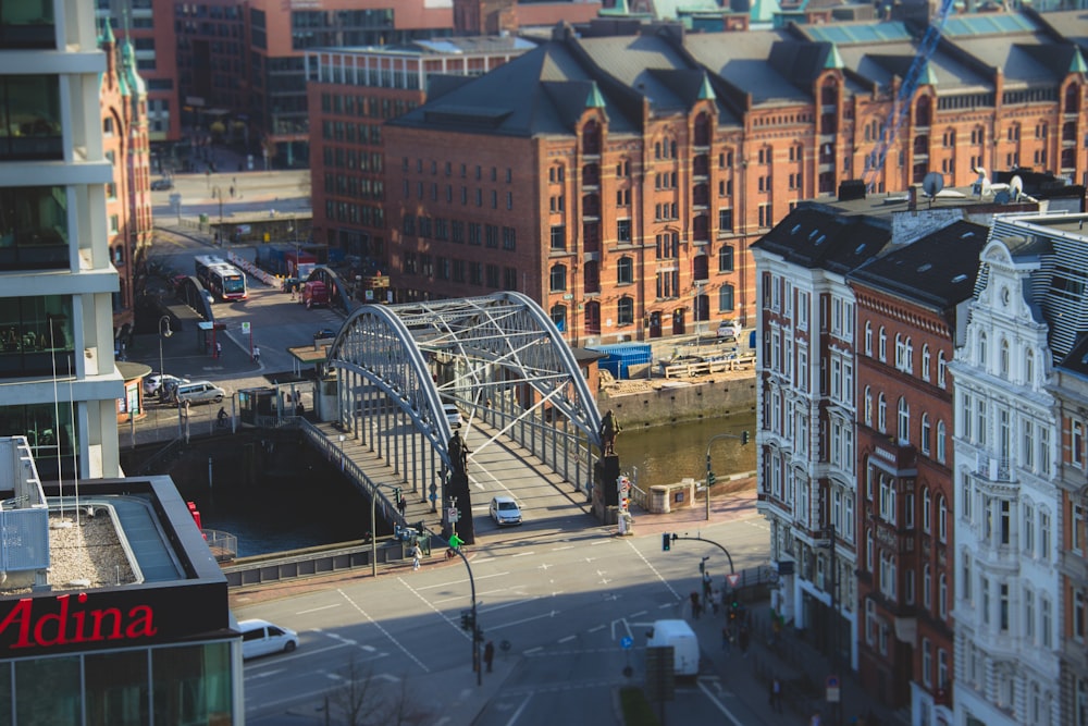 cars on road near buildings during daytime