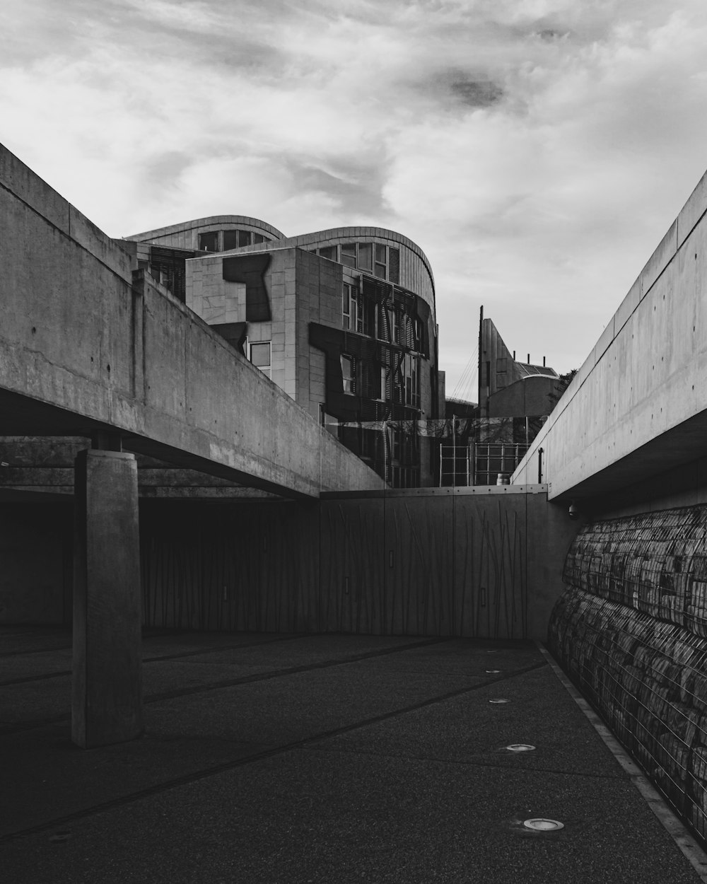 grayscale photo of concrete building