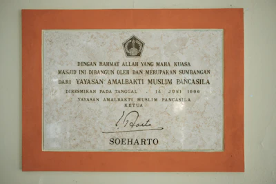 Close-up of a certificate and competency card issued by Nusawarta.