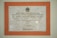 A framed plaque with a beige marble pattern background and a bold orange border featuring Indonesian text. The plaque is a commemoration from Yayasan Amalbakti Muslim Pancasila, dated June 14, 1996, and includes a signature at the bottom.