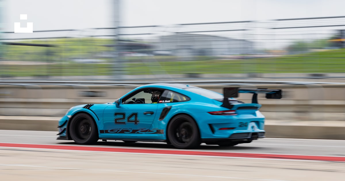 Blue and black racing car on track during daytime photo – Free Austin ...