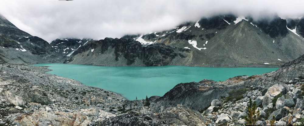 lake in the middle of mountains