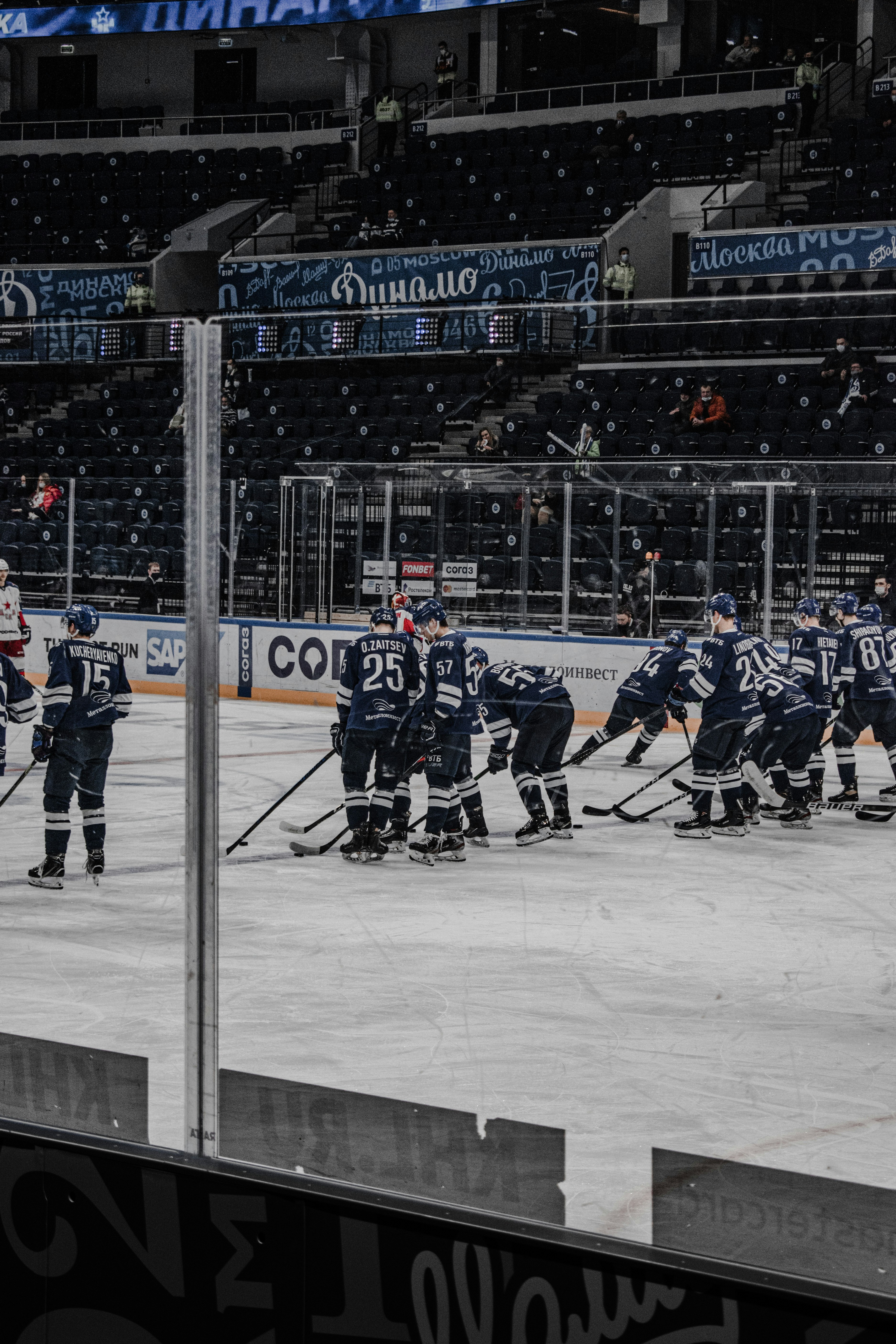 ice hockey players on ice hockey field