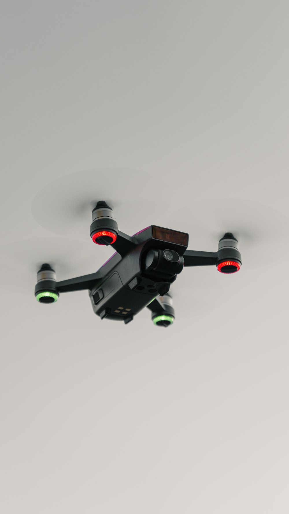 black and gray drone with white background