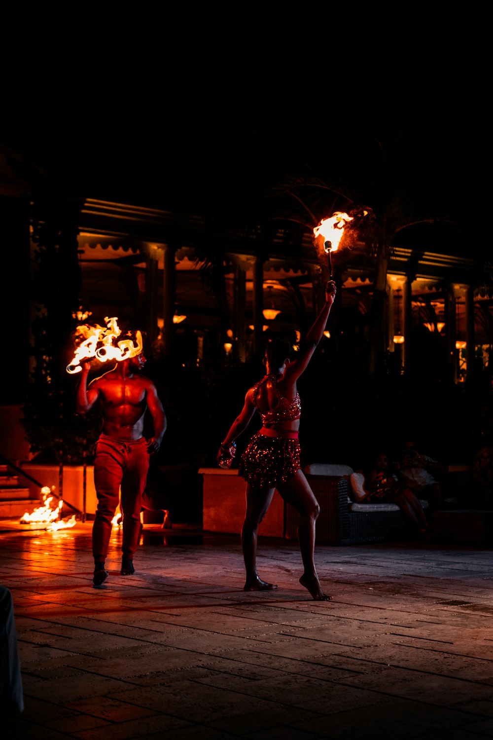 man and woman dancing on stage