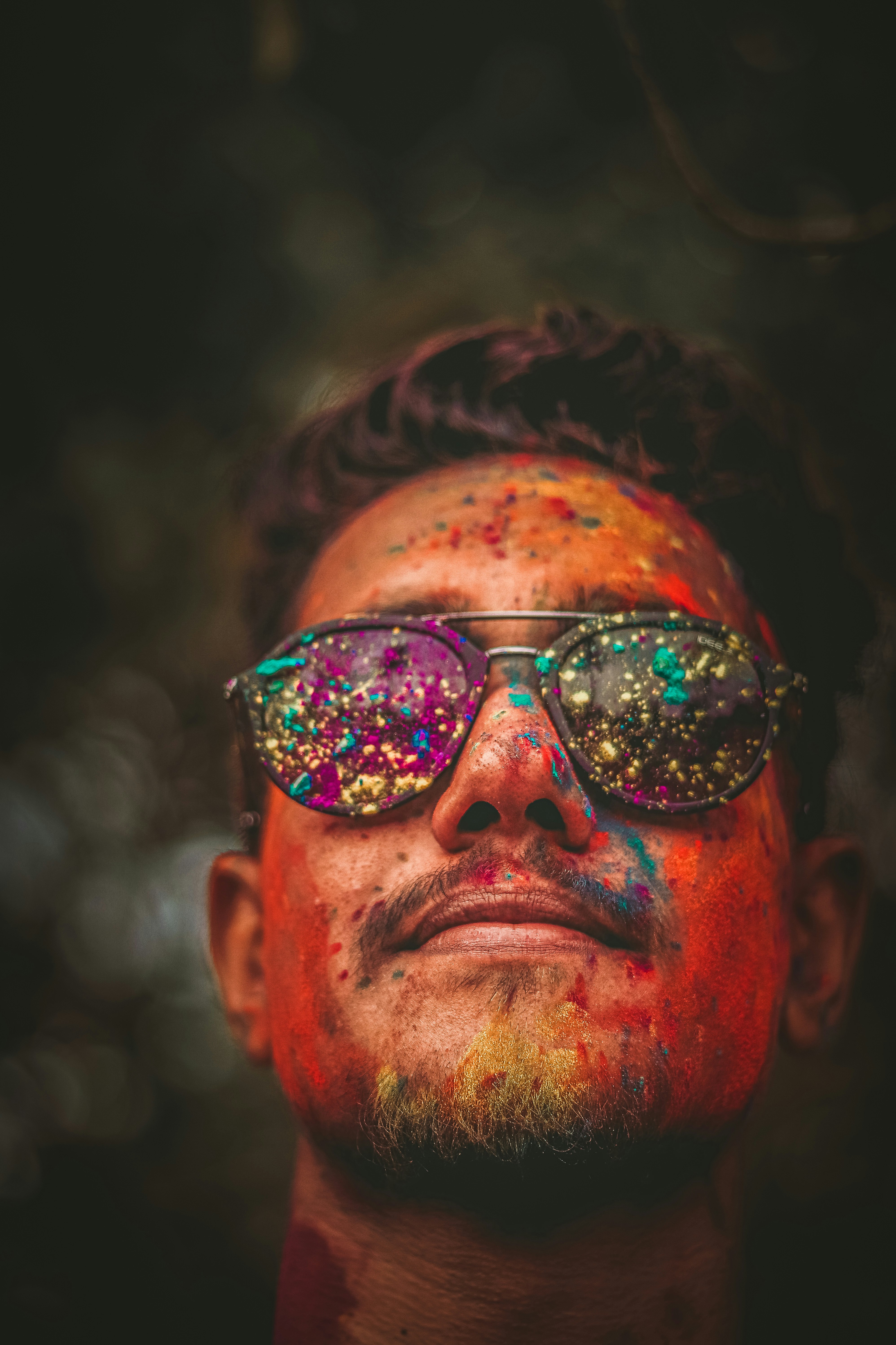 man in black sunglasses with brown hair