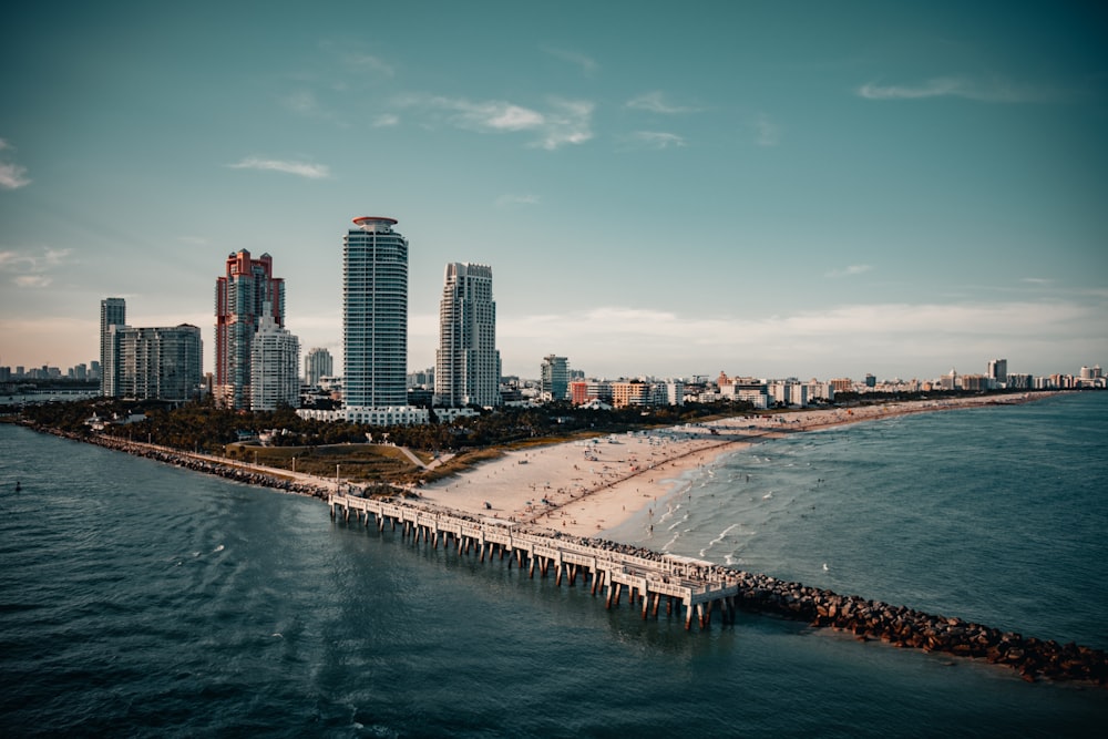 city skyline across body of water during daytime