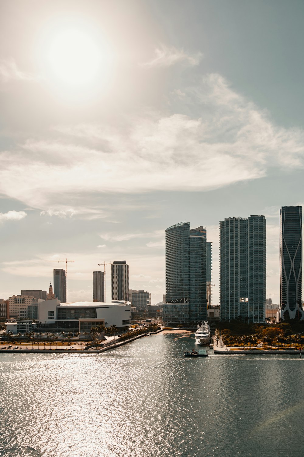 city skyline under cloudy sky during daytime