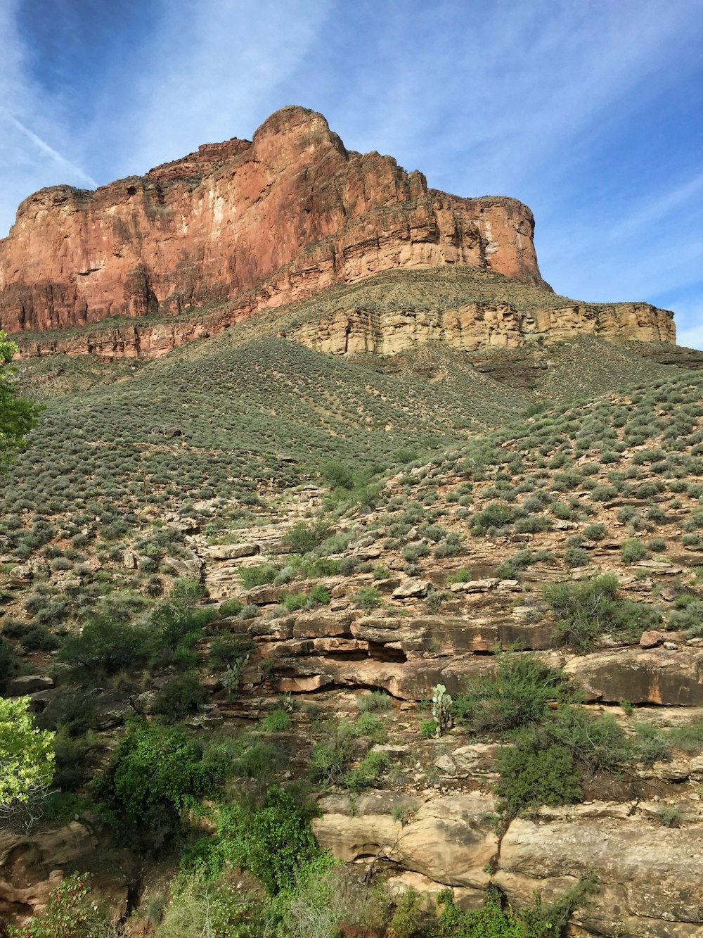 brown rocky mountain under blue sky during daytime