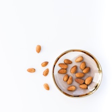 brown and white round ceramic bowl with brown and white beans