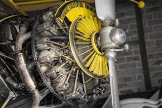 silver and yellow motorcycle engine