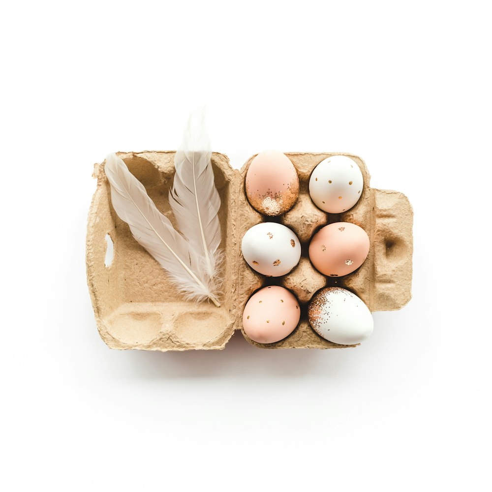 white eggs in brown paper bag