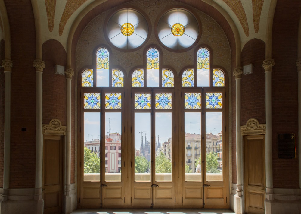 brown wooden framed glass window