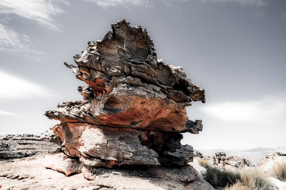 brown rock formation under blue sky during daytime