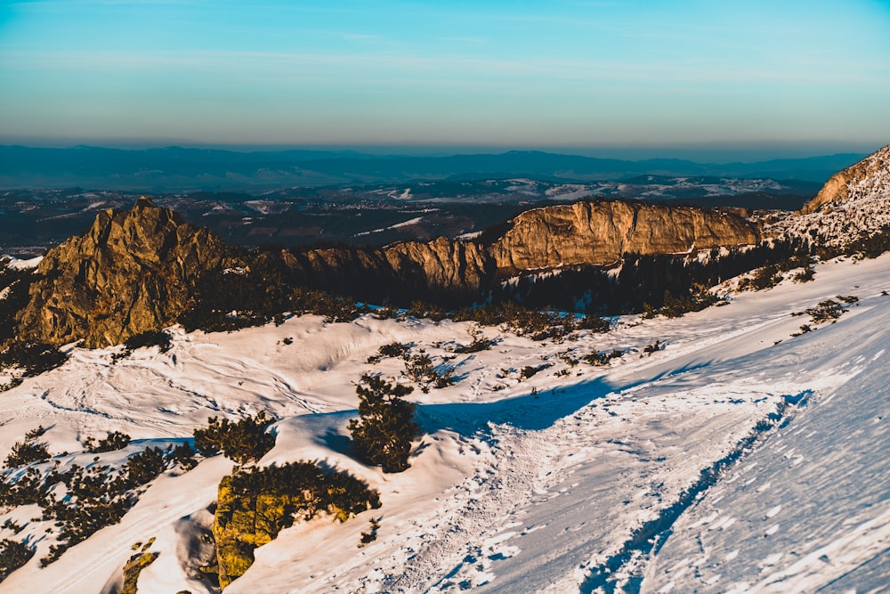 snow covered mountain during daytime