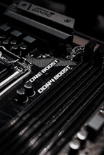 black and white typewriter on brown wooden table