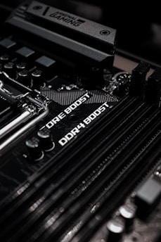 black and white typewriter on brown wooden table