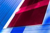 Completed exterior painting project on a modern building with contrasting colors.