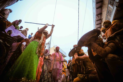 Colorful street scenes from a Tamil Nadu festival, with locals dressed in traditional attire and festive decorations.