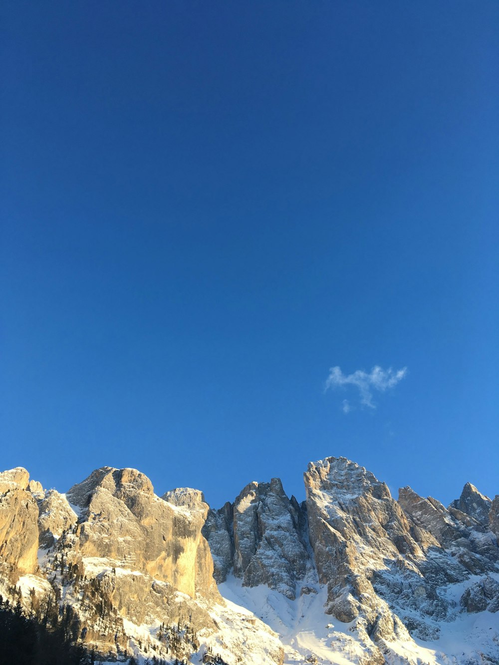 rocky mountain under blue sky during daytime