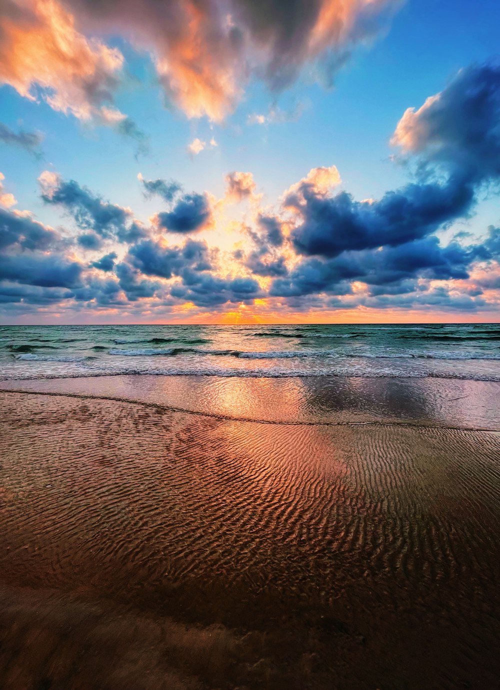 blue sky and white clouds over the sea