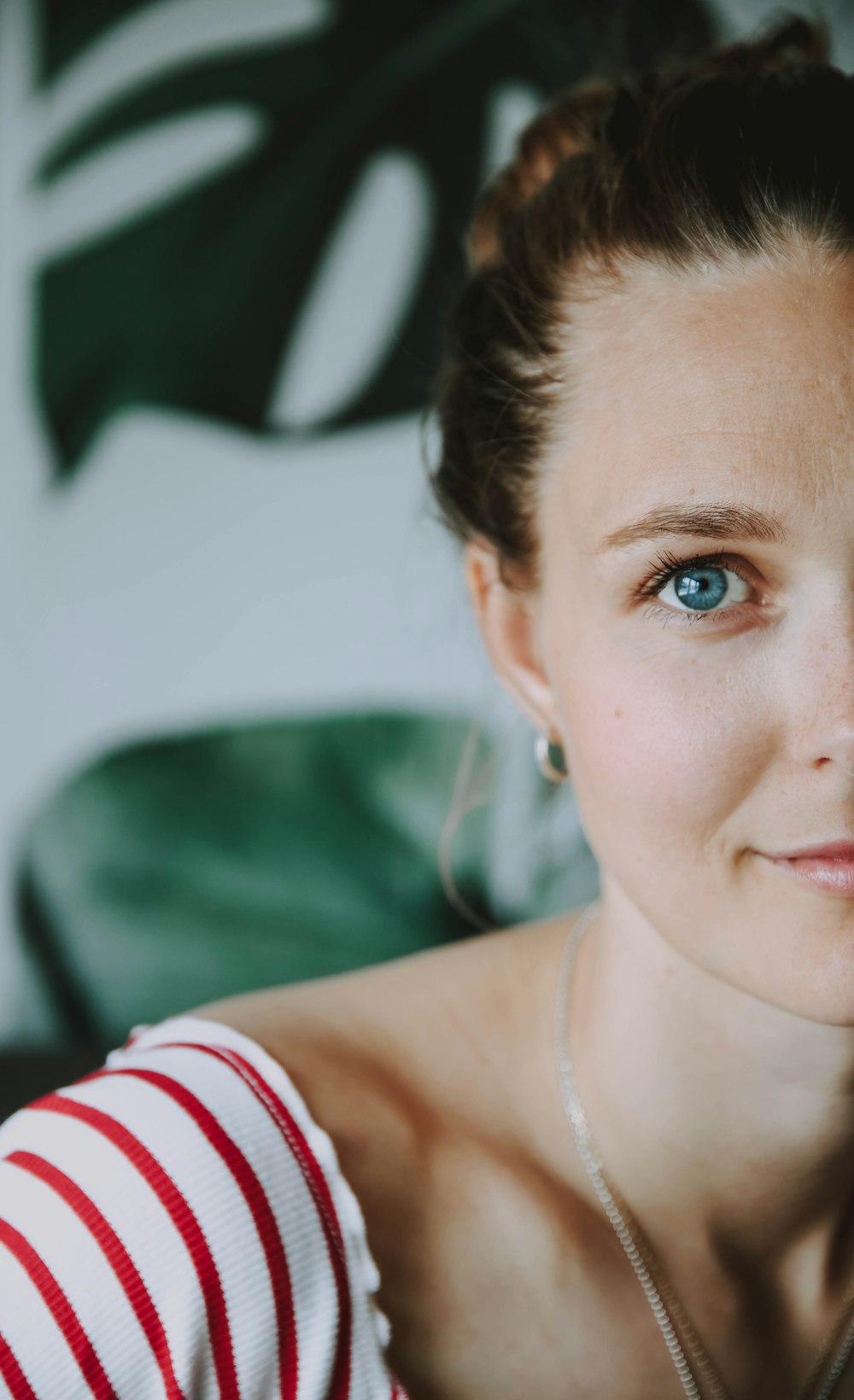 woman in red and white stripe shirt