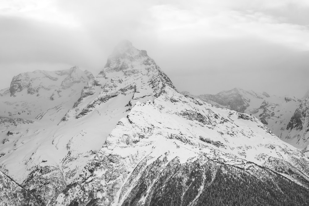 grayscale photo of snow covered mountain