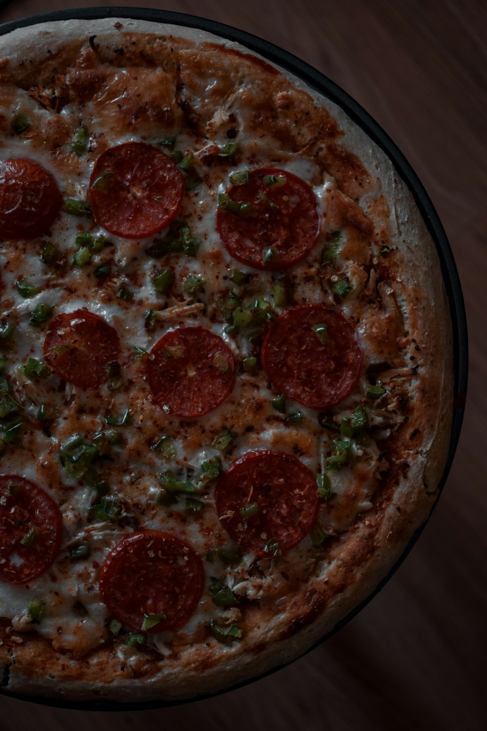 pizza with green and red sauce