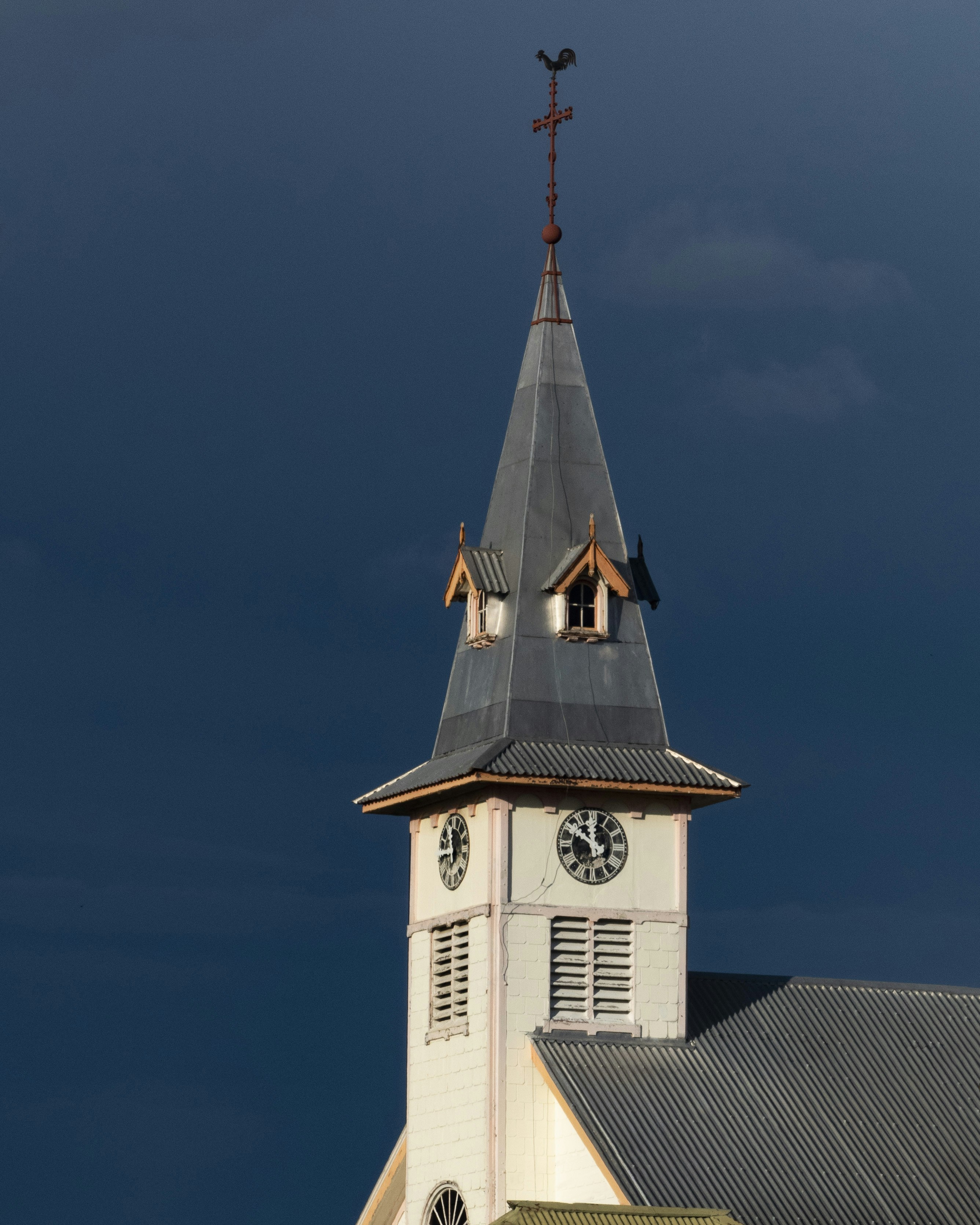 white and black church under blue sky during daytime