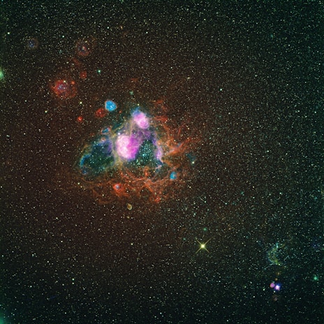 A colorful nebula captured in deep space photography.