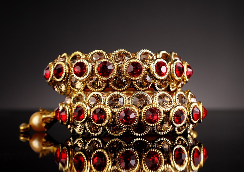 gold and red beaded accessory