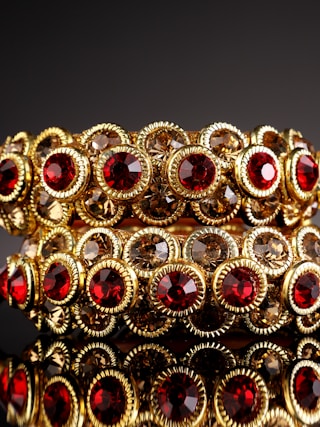 gold and red beaded accessory