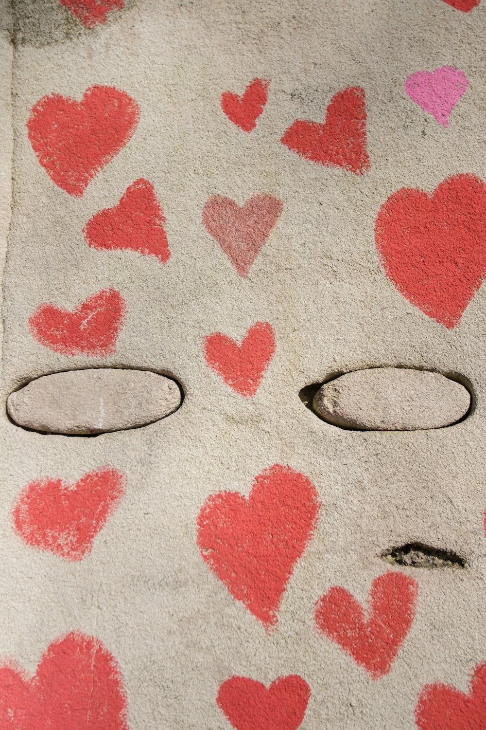 silver ring on gray and red textile