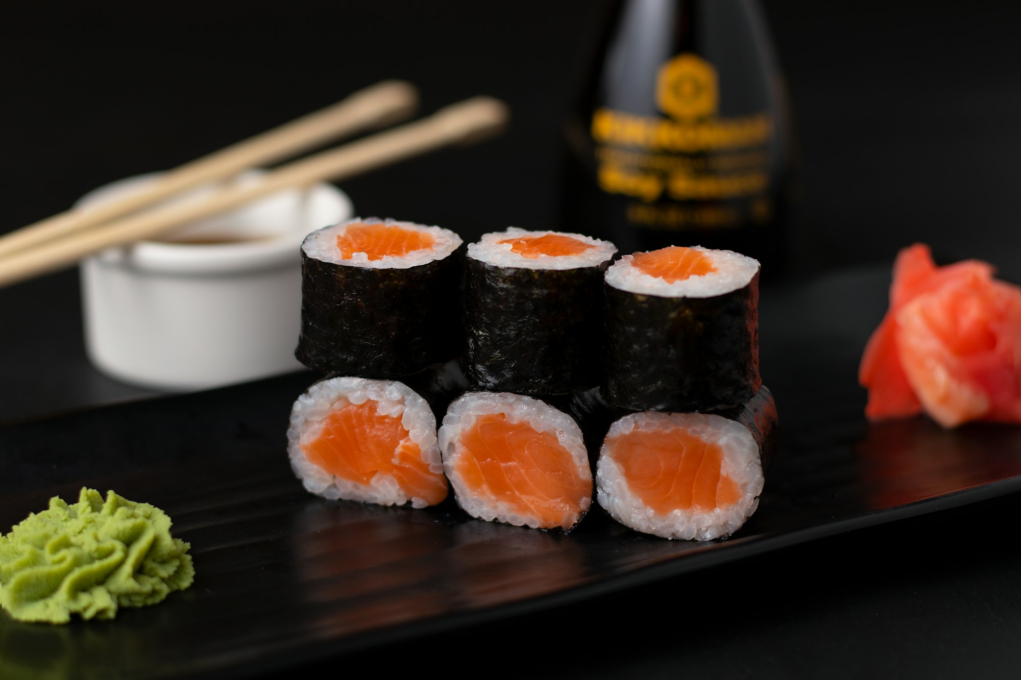 Sushi wrapped in seaweed being delicious