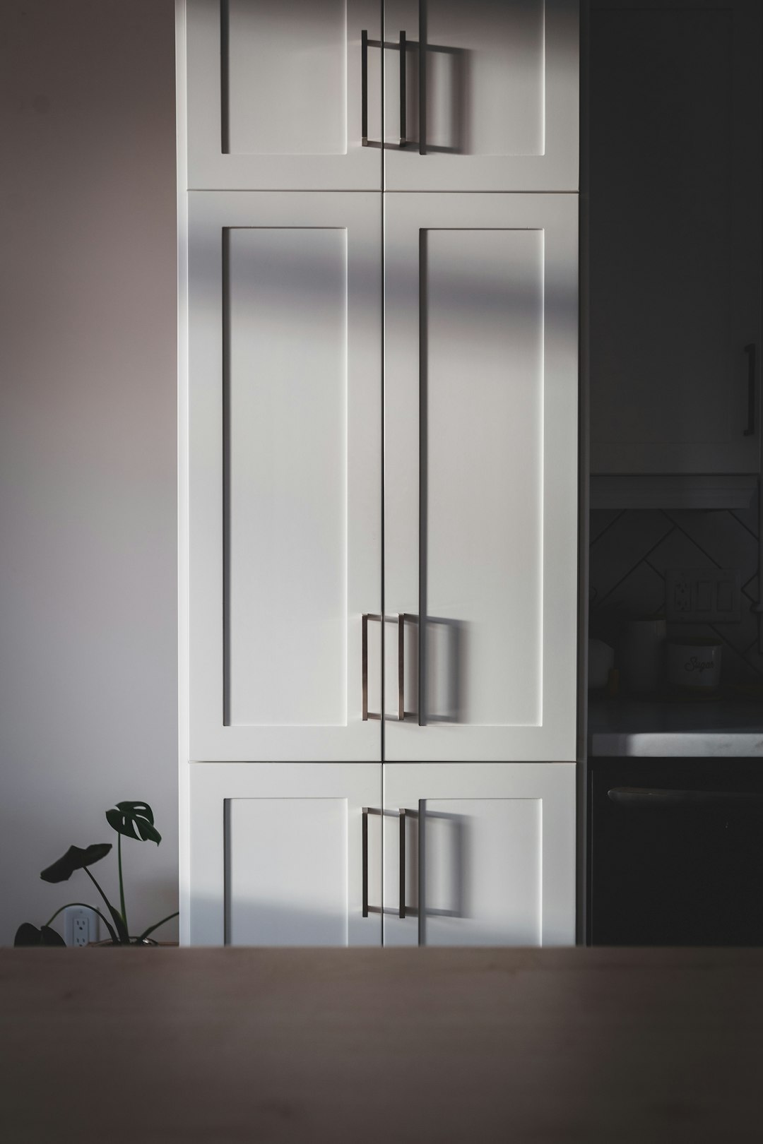  white wooden cabinet with mirror cupboard