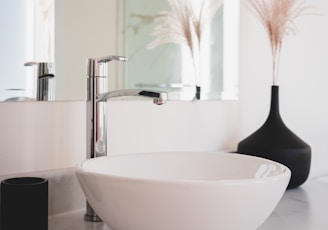 White Ceramic Vessel Sink on White Counter