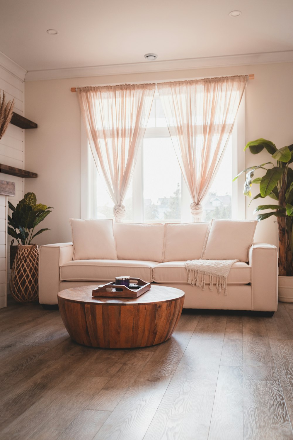 white and brown sectional couch