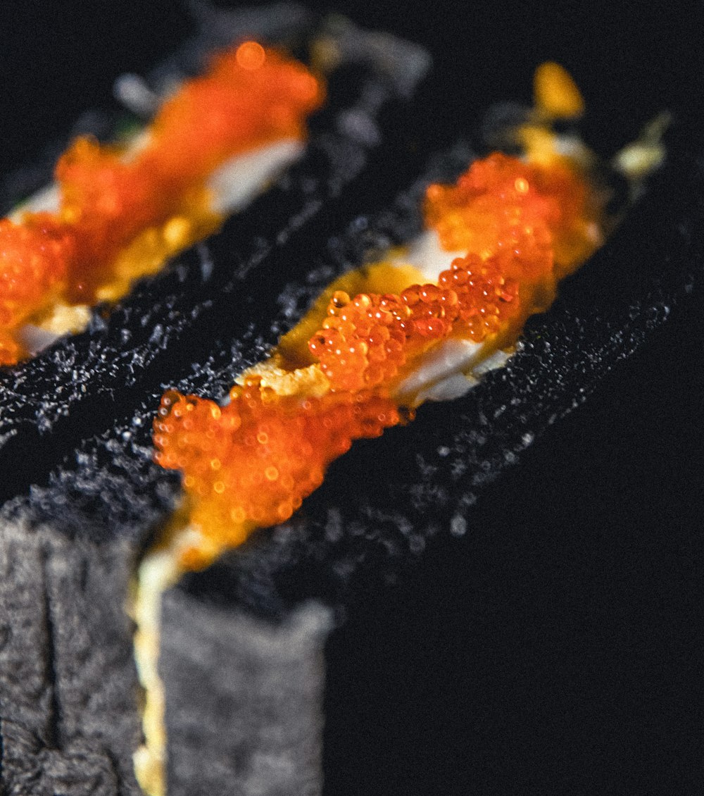 white and brown cake on black tray