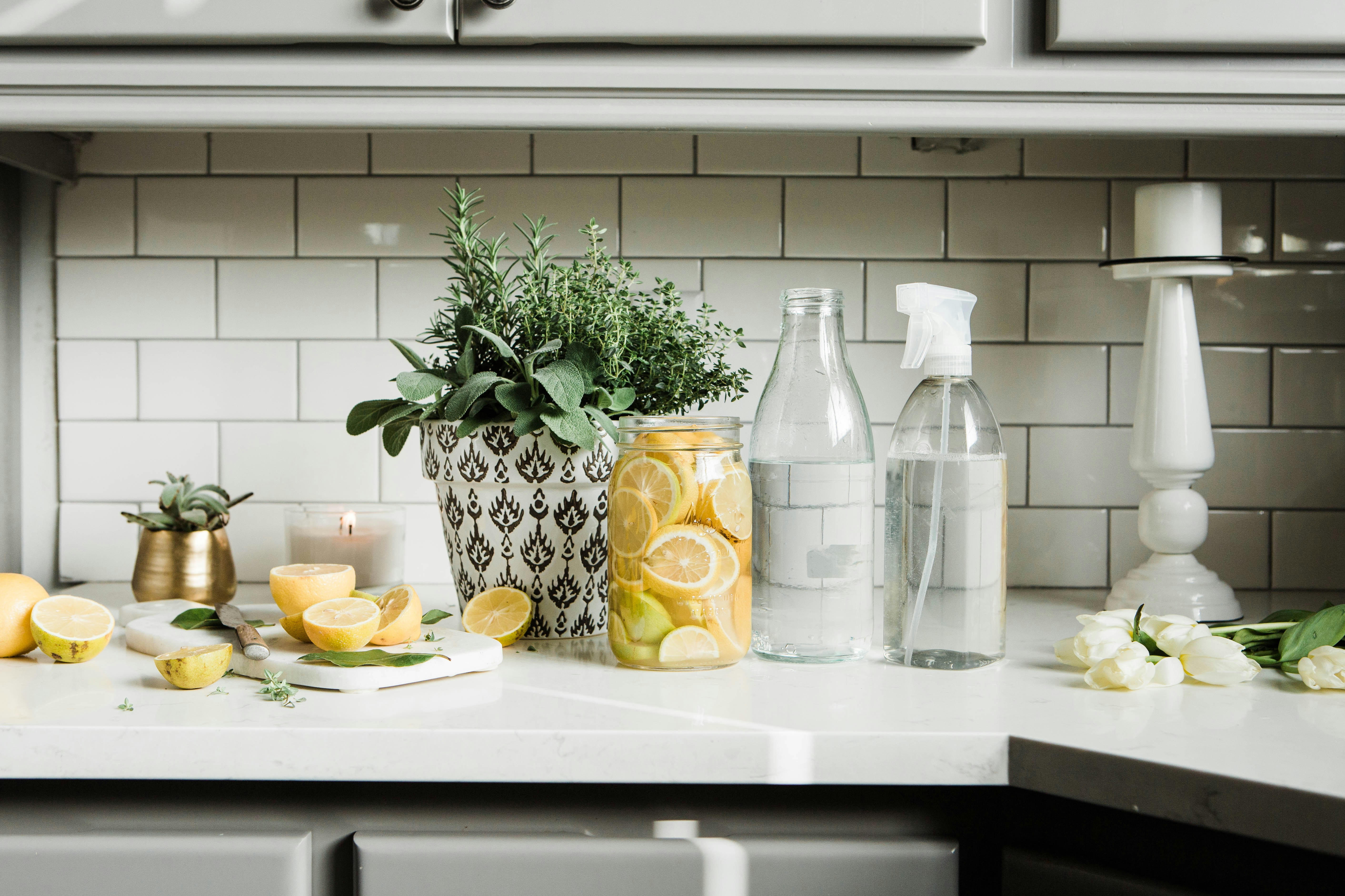clear glass bottles on white table