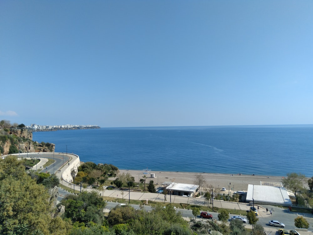 aerial view of city near sea during daytime