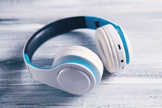 white and orange cordless headphones