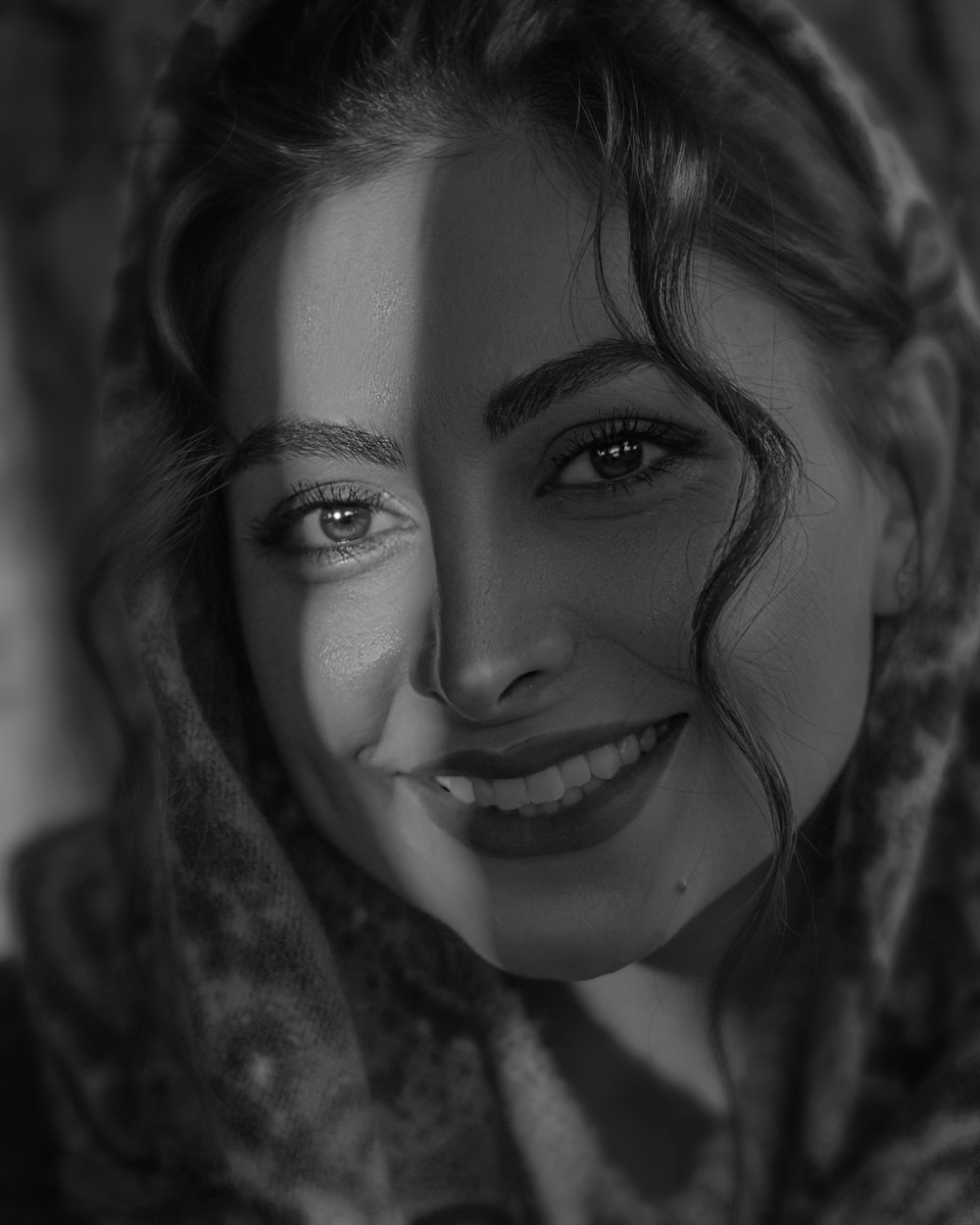 grayscale photo of womans face