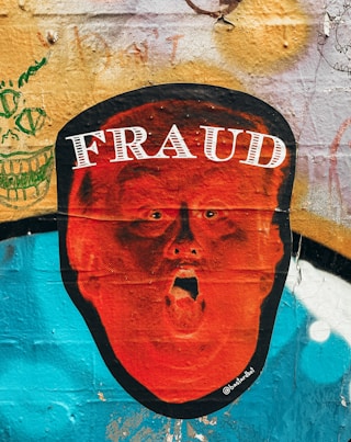 man in black and white fitted cap by Jon Tyson (@jontyson)