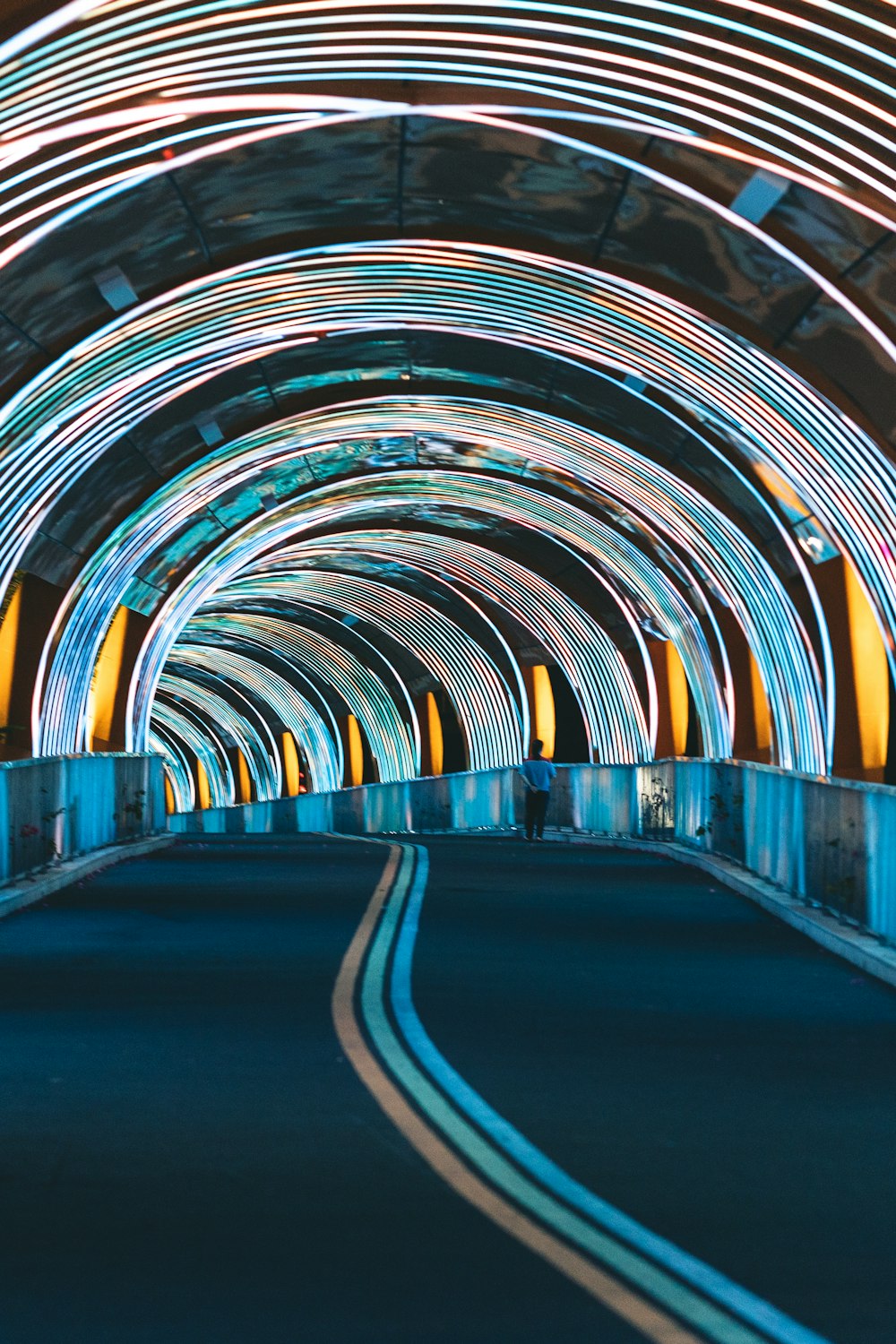blue and yellow tunnel during daytime