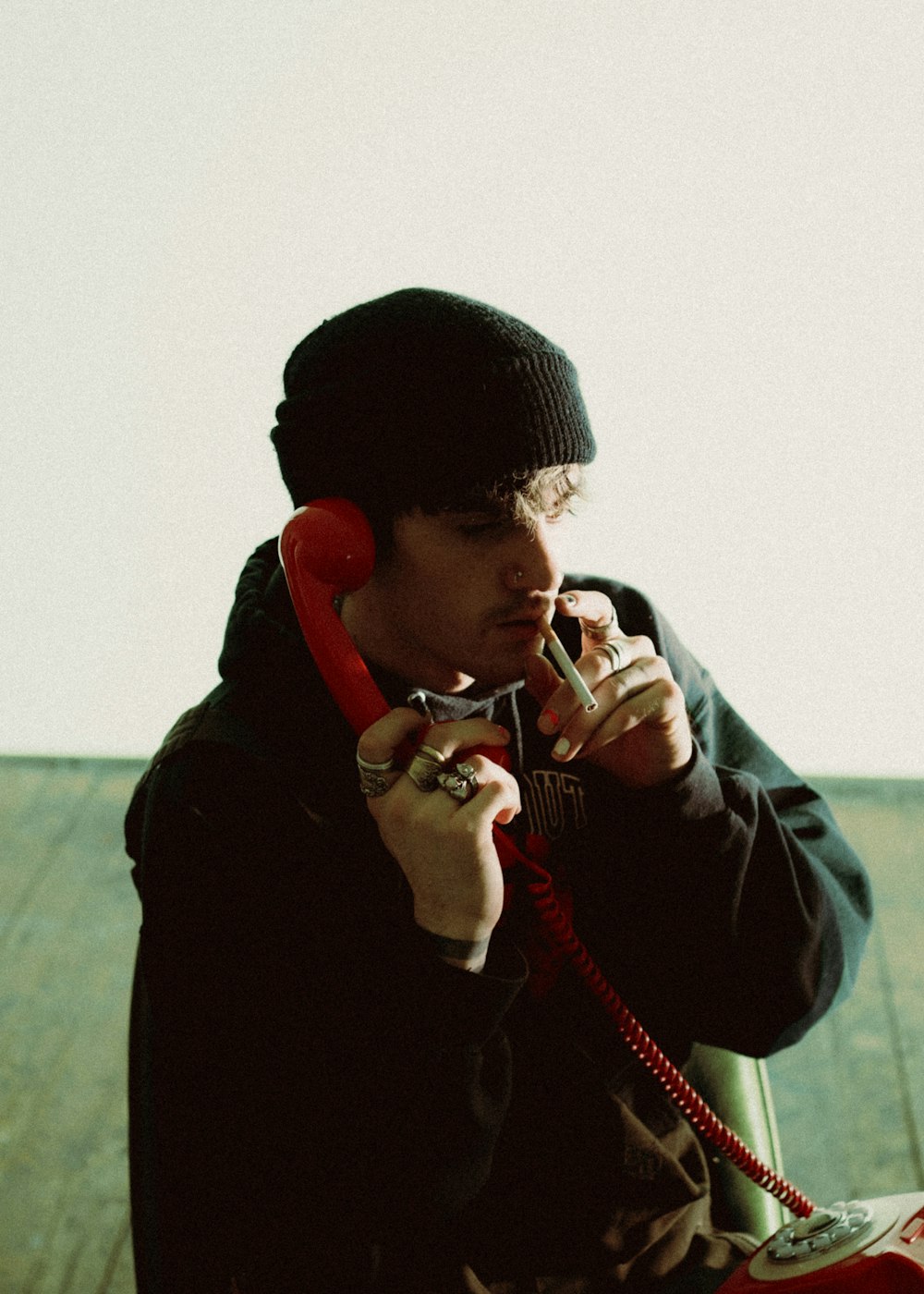 man in black knit cap and black jacket